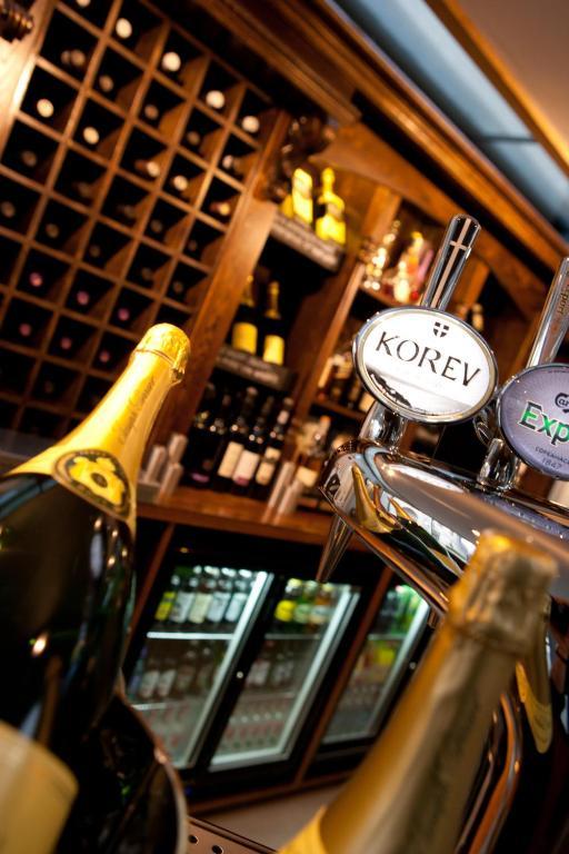 The Three Crowns Hotel Chagford Bagian luar foto A bottle of Korov